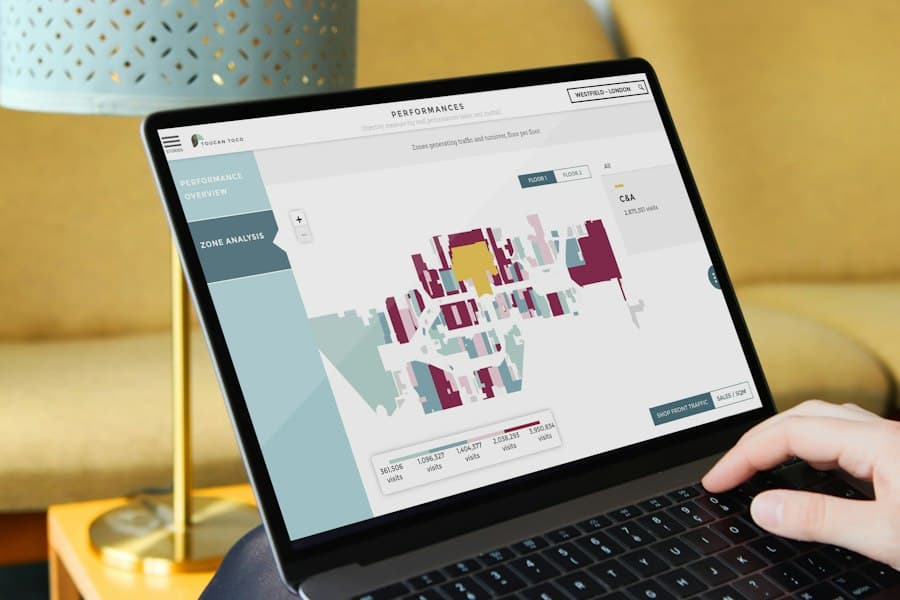 A laptop showing a property map and floor plan